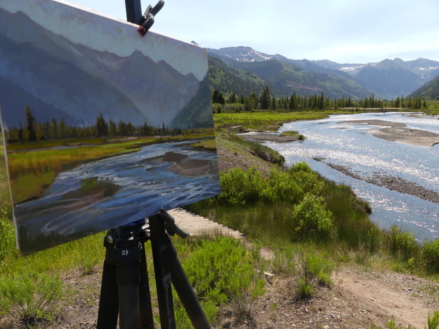 Painting on easel outdoors
